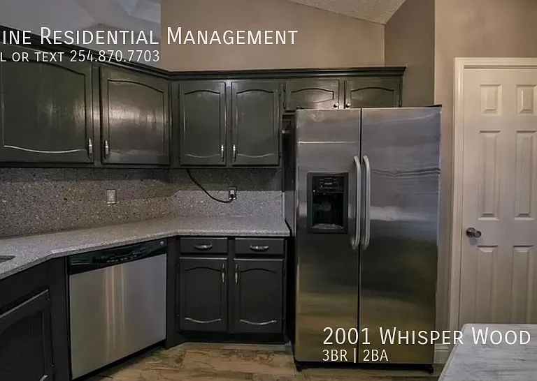 2001 Whisper Wood Rd — Photo 2