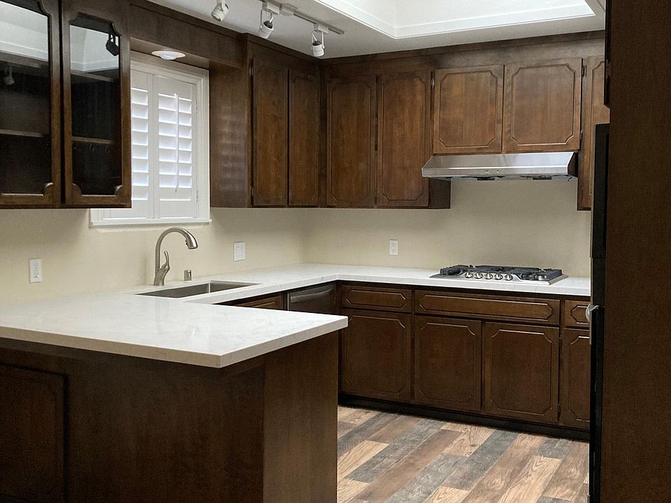 New Kitchen with natural skylight and new appliances. Lots of cabinet storage.