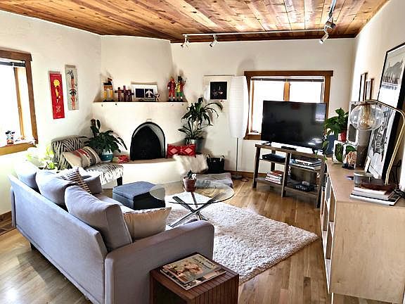 Living Room with kiva fireplace