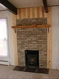 Fireplace with electric inset