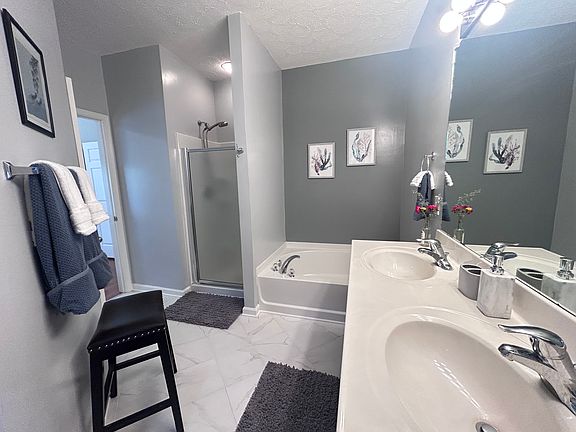 Separate shower & tub.