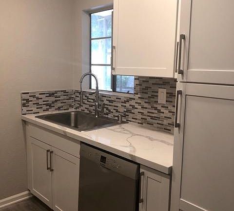 Bosch stainless steel dishwasher and large single sink