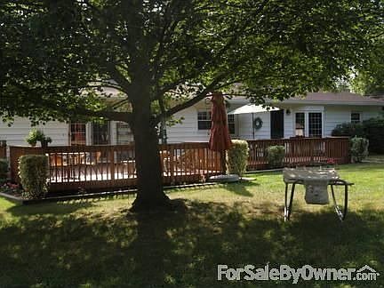 Spacious backyard with extended deck