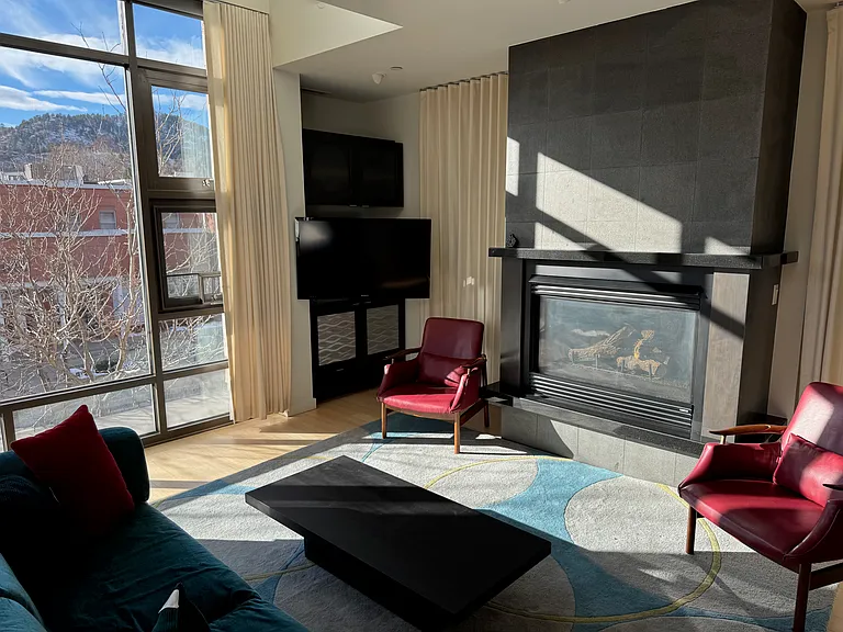 Main living room with fireplace.