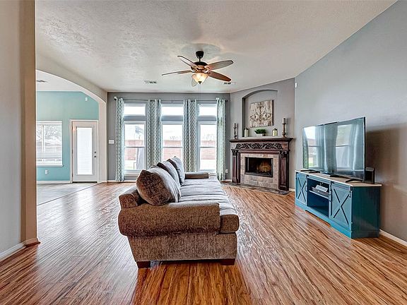 Beaming wood floors add style to your living room.