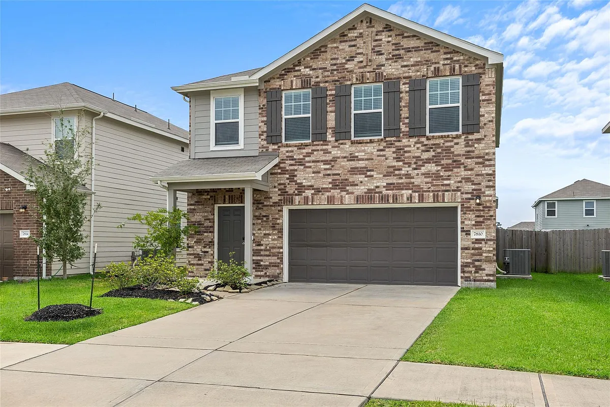 Building Photo - 7810 Pink Dahlia Dr