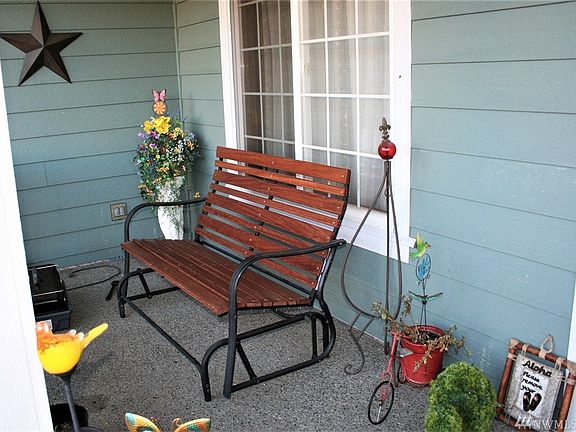 Covered Front Porch Is Very Inviting...