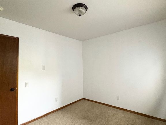 North bedroom with three large walls for flexible furniture arrangement, 5 foot closet, and window with plenty of natural light