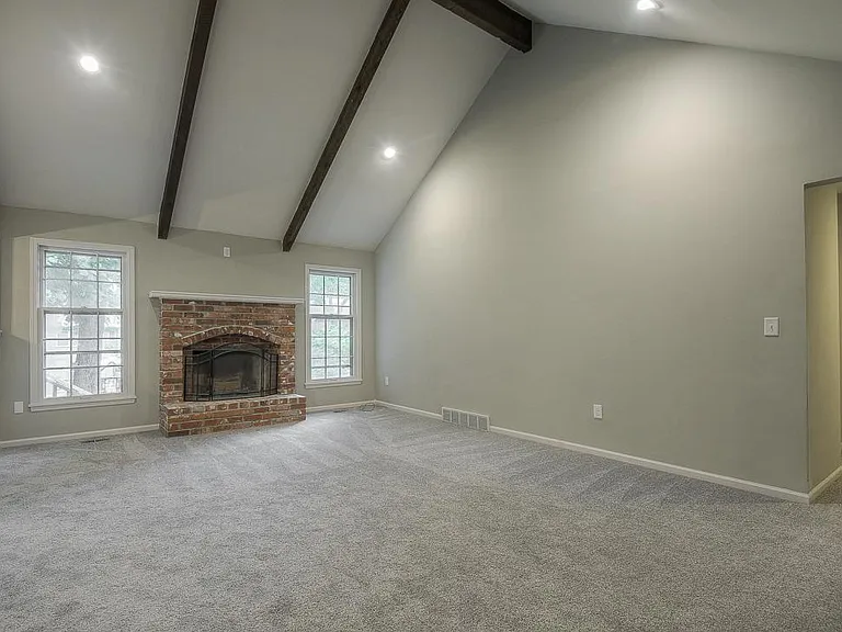 Fireplace and views to the backyard make the family room extra-inviting.