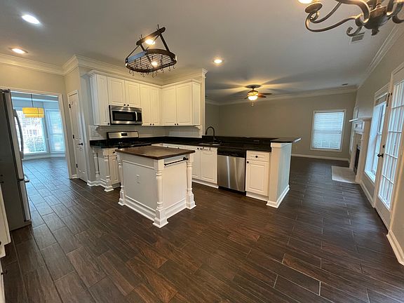 Open-concept layout creates a seamless flow _ ideal for entertaining and everyday living.