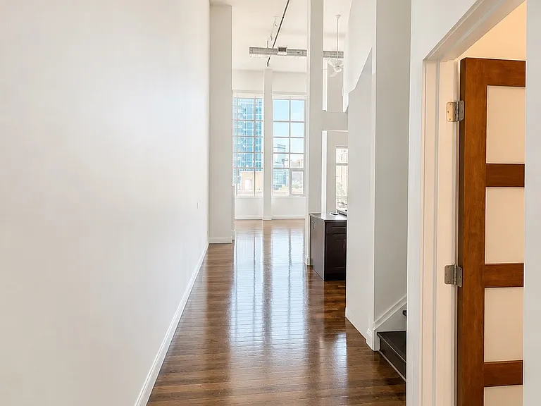 Welcoming entry hallway leading into the open-concept loft.