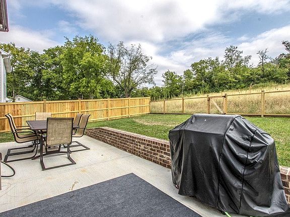 Chill on this custom-made back patio