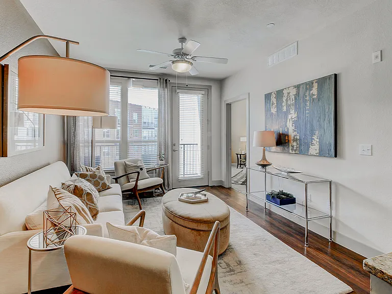Apartment living room with wood-style flooring.