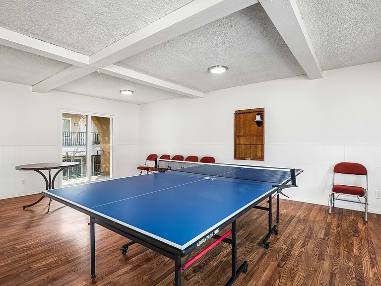 Recreation room loft with ping-pong table and games