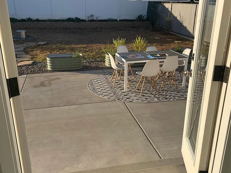 Back patio, large fully fenced yard
