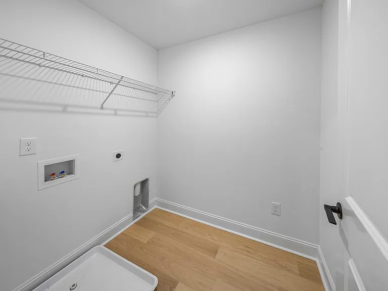 Laundry room conveniently located upstairs near bedrooms