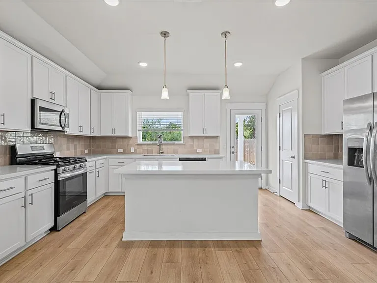 7712 Poppy Petal Loop — Photo 1