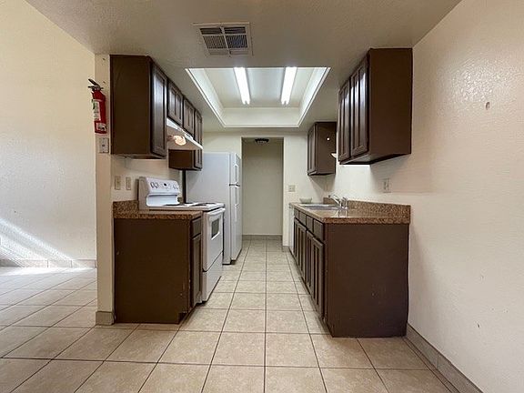 Kitchen facing utility room