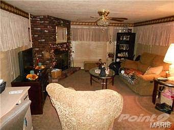 Floor to ceiling brick fireplace in Living Room