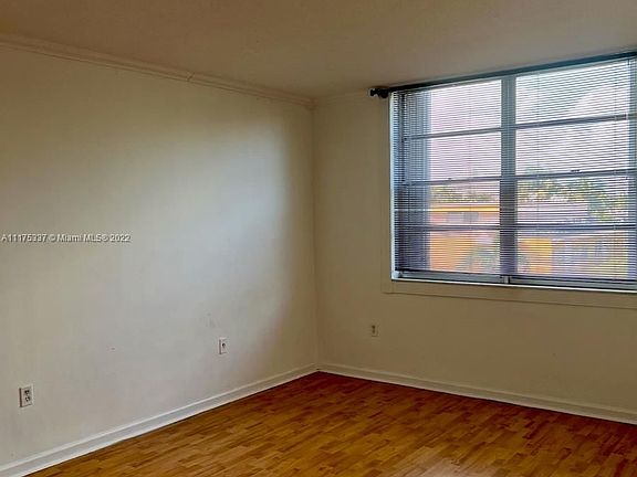 5th image of 1080 94th St APT 409