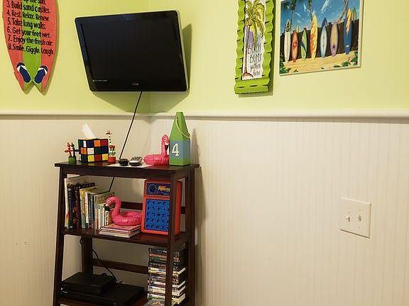 "Bunk Room" has DVD player, cable, assorted books, toys, games and DVDs for the younger crowd. There are twin bunks with a twin trundle in this room.