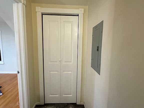 Private entrance with skylight carpet deodorizer on carpet.