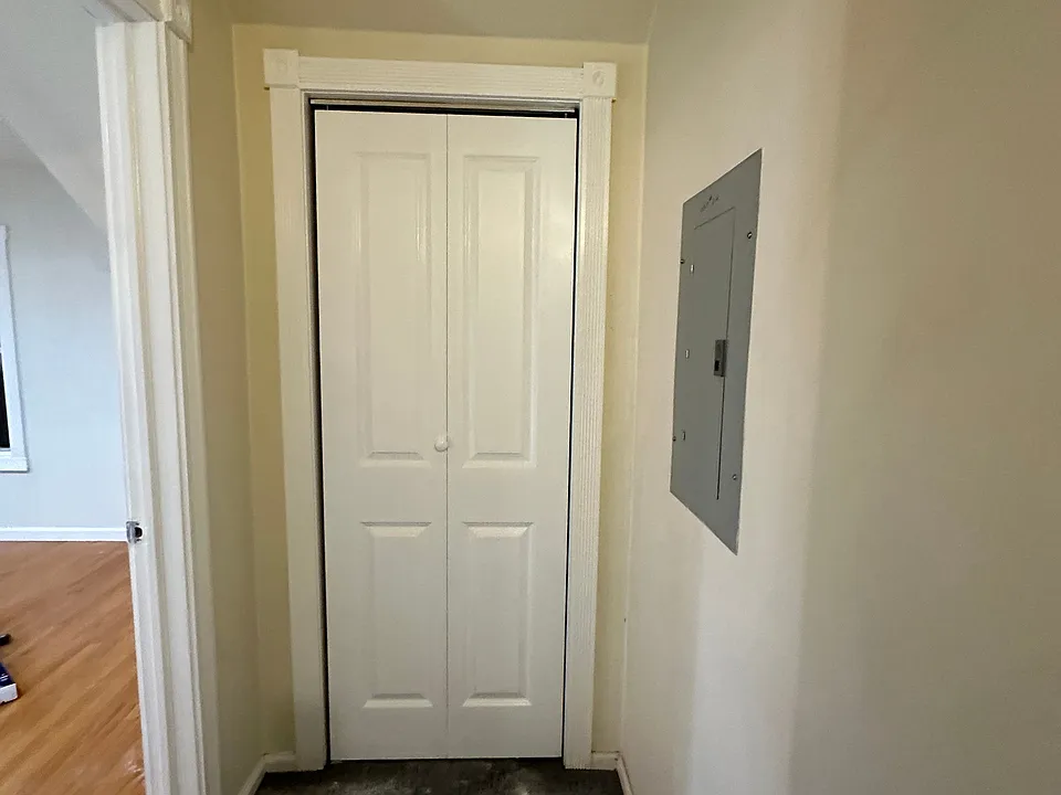 Private entrance with skylight carpet deodorizer on carpet.