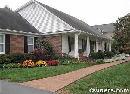 Front of house with brick walk