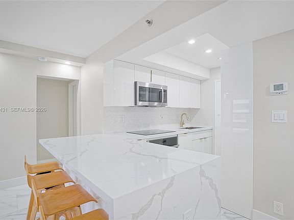 5th image of 5225 Collins Ave APT 1403