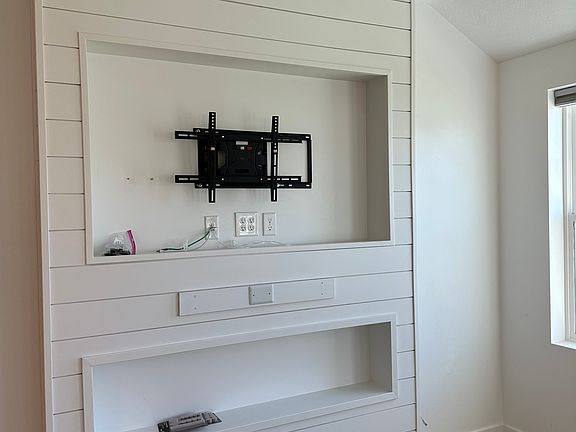Customer shiplap with TV wall mount.