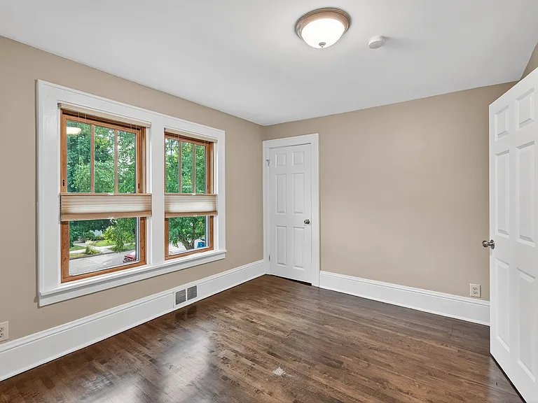 Additional Bedroom with large windows and closet space.