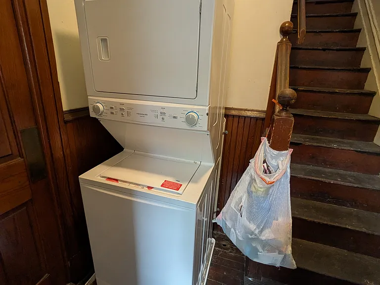 Shared laundry and interior steps (one flight of interior steps to get to entrance)