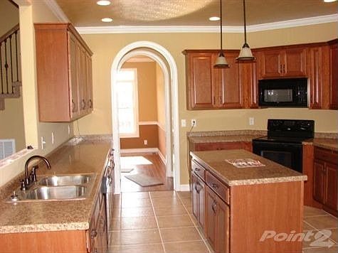 Island very open concept. Has breakfast nook and formal dining.