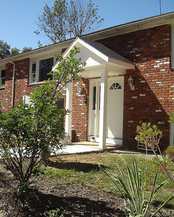 Private 8 unit complex with brick exterior and new windows
