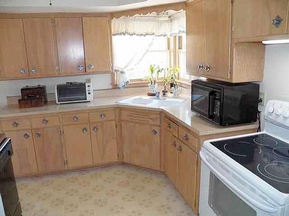 Kitchen includes appliances
