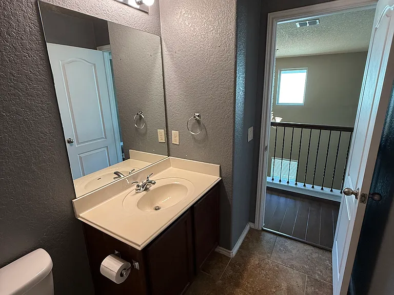 Upstairs full bathroom with tub and shower