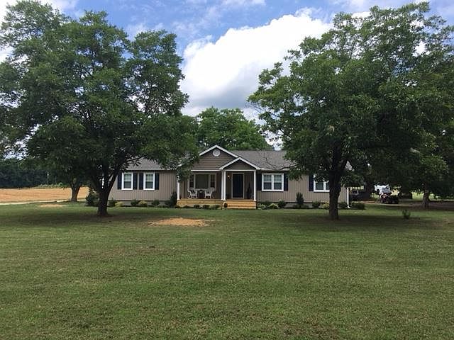 Fruit trees and lush acreage