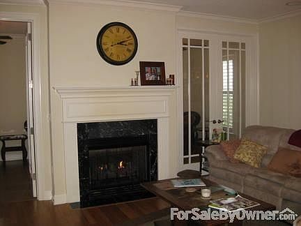 Great Room
						:
						Downstairs Great Room with View of Double Sided Fireplace