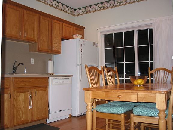 Another View of Eat-In Kitchen w/Sliders to Patio