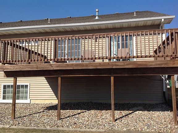 Backyard deck which is directly by a kids park.