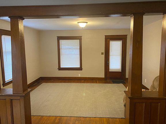 Hardwood floors throughout, area rugs in every room