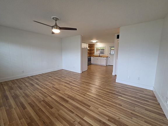 Spacious living right off entry with new LVP flooring throughout