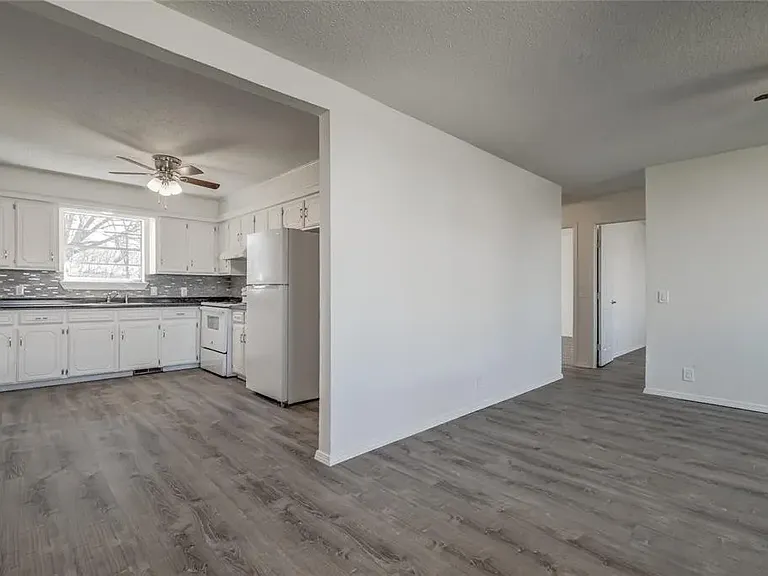 Looking from Front Door into Kitchen and towards hallway