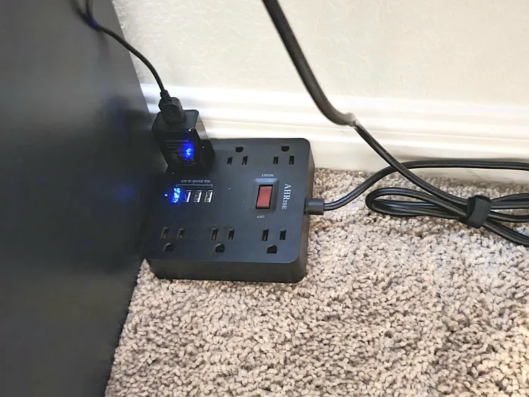 Power strip with USB ports for phone charging included in all work stations