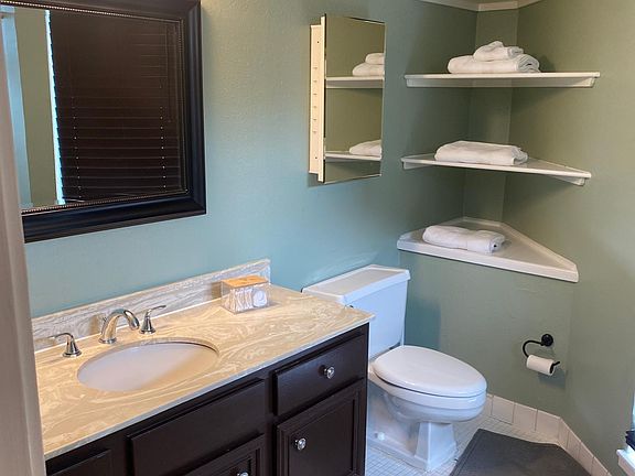 Master Bathroom has shower/tub with transom.
