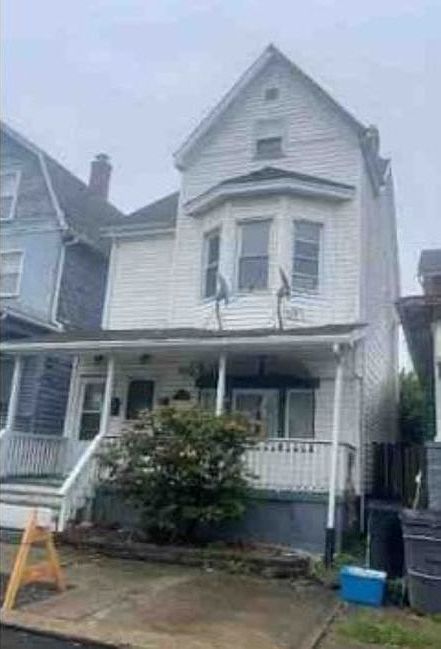 1st image of 107 E 5th Ave