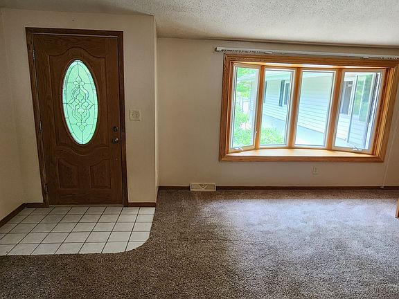 Living Room with bat window