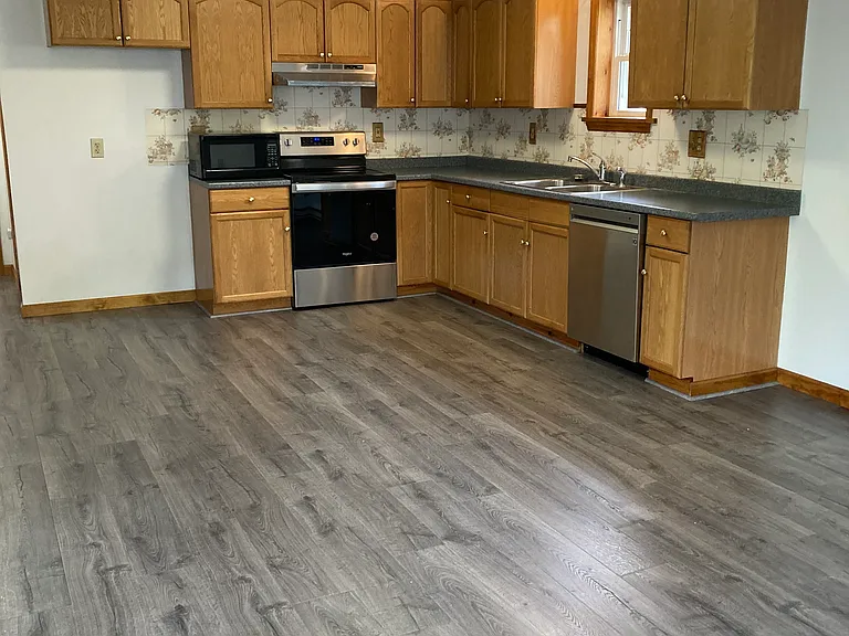 kitchen view; new stove and dishwasher 2024