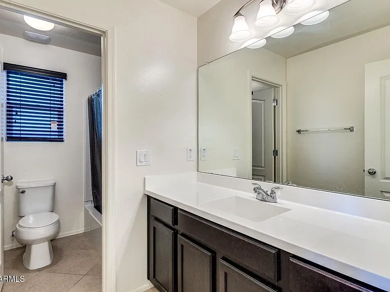 12057 W Rowel Rd — Photo 13