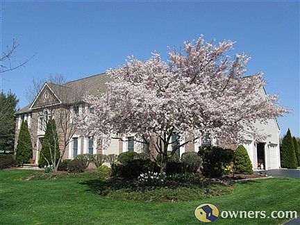 Front house w/3 car garage on side